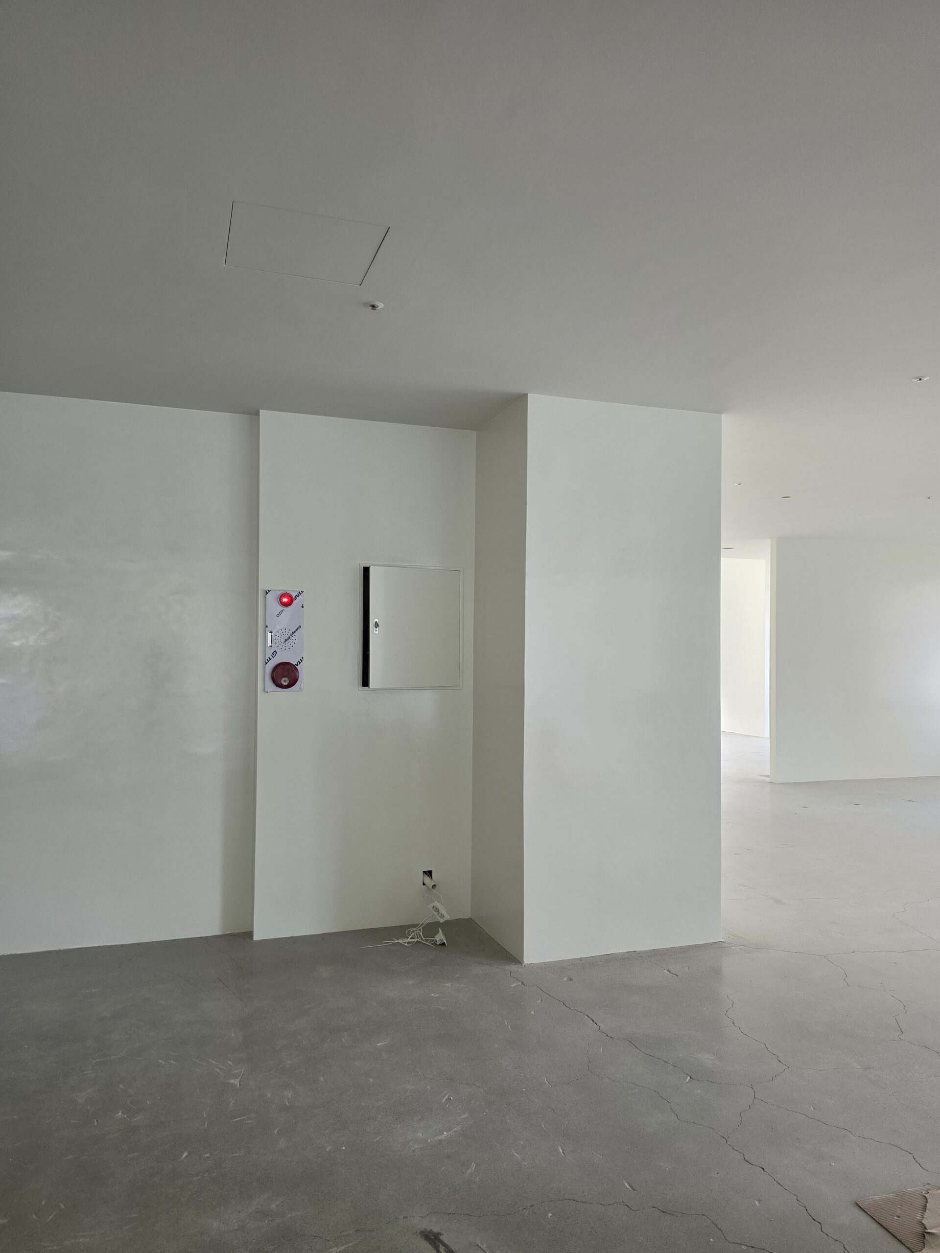 commercial interior columns white walls