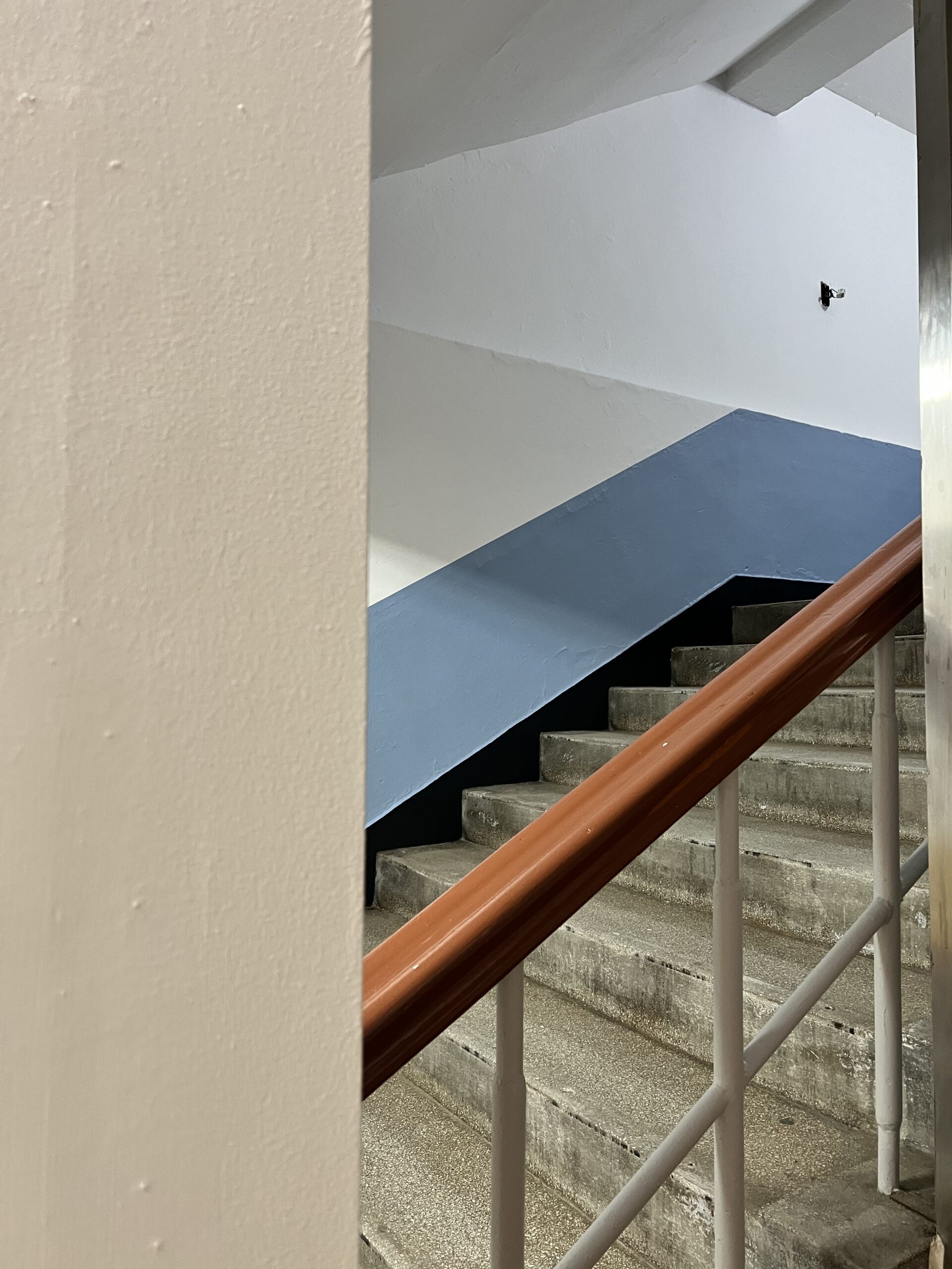 school stairwell painted wall